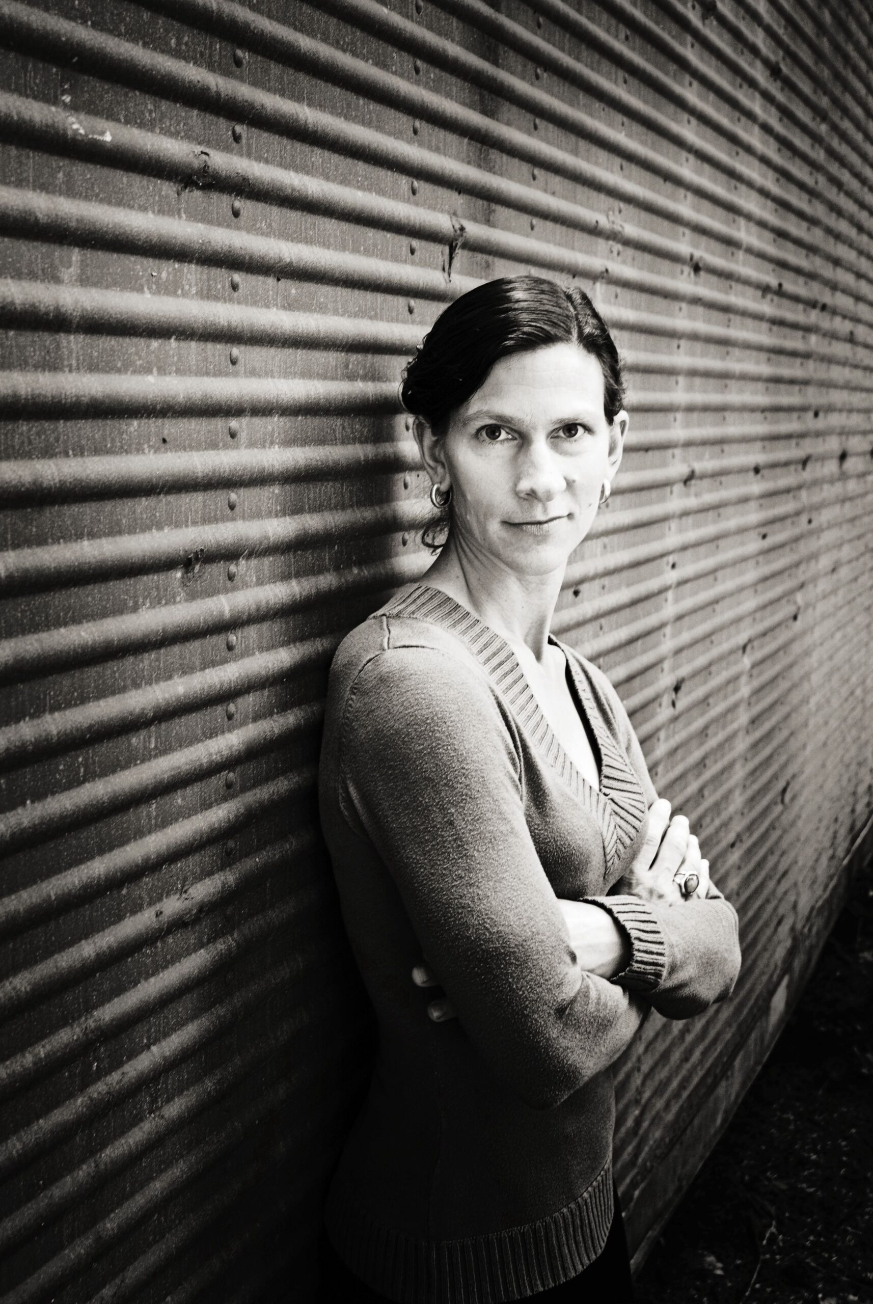 Black and white image of Brenda in front of a boxcar.